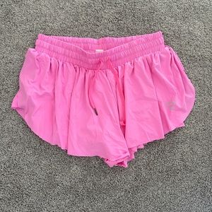 Pink flowy running shorts